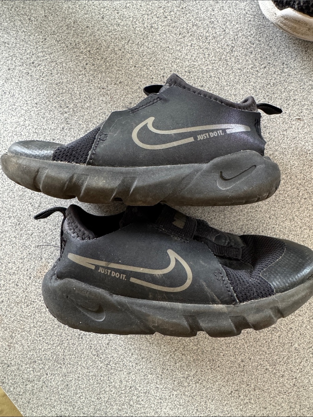 Nike Kids Black Slip-On Athletic Sneakers with Reflective Swoosh
